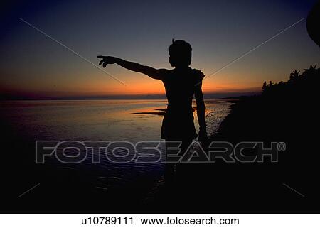 Stock Image - beach, people, silhouette, water, woman. Fotosearch
