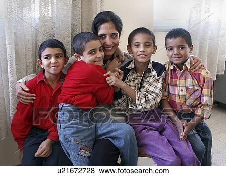 Stock Photo - boys, house, 8054, person, sport, people. Fotosearch