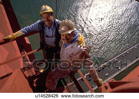 Stock Photograph - bridge, construction, gate, golden, workers, water. Fotosearch