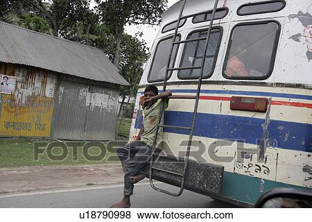 bus, person, hanging, boy, bangladesh, people View Large Photo Image Stock Photo - bus, person, hanging, boy, bangladesh, people. Fotosearch