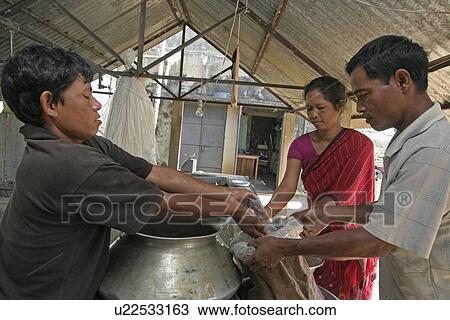 Stock Image - buying, people, bangladesh, fish, person, family. Fotosearch