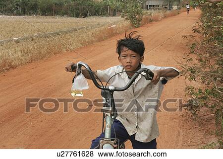 Stock Photo - cambodia, child, kid, children, person, people. Fotosearch