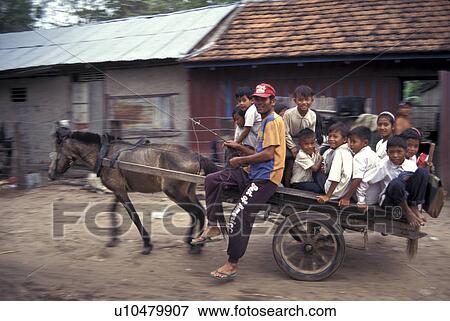 Stock Photo - cambodia, horse, children, school, person, people. Fotosearch