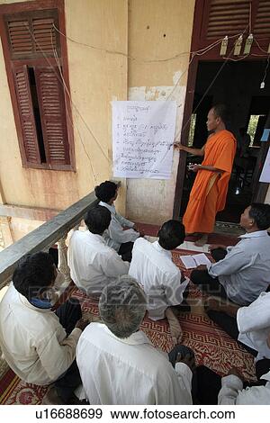 Stock Photo - cambodia, people, book, school, person, background. Fotosearch