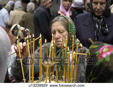 candles, people, lighting, russia, person, love View Large Photo Image Stock Photo - candles, people, lighting, russia, person, love. Fotosearch