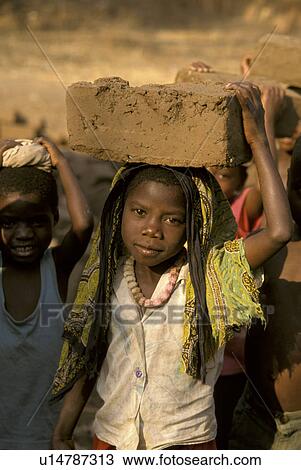 carrying, girl, mozambique, school, person, people View Large Photo Image Stock Image - carrying, girl, mozambique, school, person, people. Fotosearch