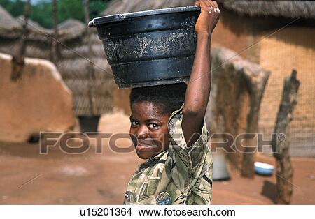 carrying, people, ghana, person, girl, water View Large Photo Image Picture - carrying, people, ghana, person, girl, water. Fotosearch