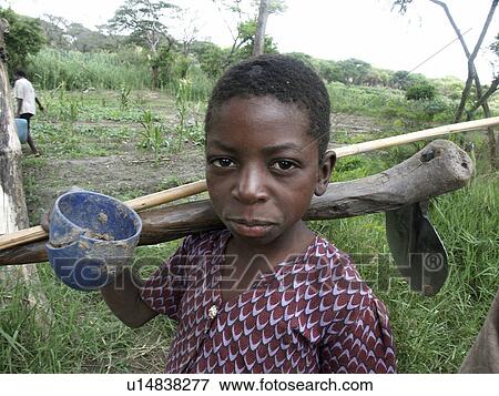 Stock Photo - carrying, person, kasisi, boy, zambia, people. Fotosearch
