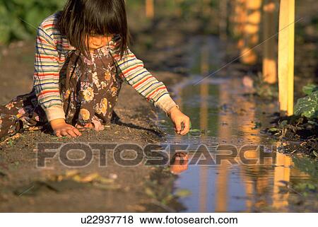 Stock Photo - children, water, child, girl, people, family. Fotosearch