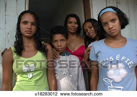Stock Image - children, woman, person, house, people, family. Fotosearch