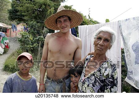 Stock Photo - children, woman, person, house, people, family. Fotosearch