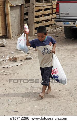 Stock Photograph - dirt, person, walking, hispanic, mexico, people. Fotosearch