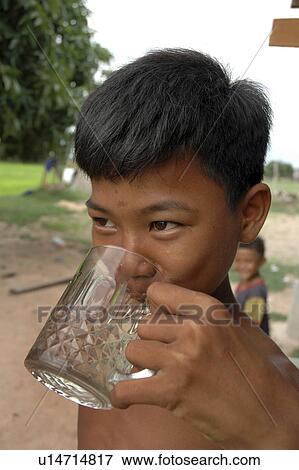 drinking, people, boy, cambodia, person, water View Large Photo Image Stock Photo - drinking, people, boy, cambodia, person, water. Fotosearch