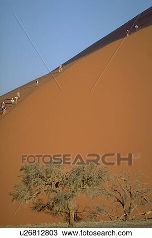 dune, walking, sand, huge, up, people View Large Photo Image Stock Image - dune, walking, sand, huge, up, people. Fotosearch