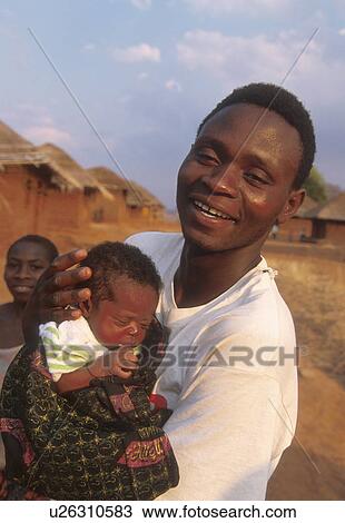 father, people, mozambique, 3528, person, baby View Large Photo Image Stock Image - father, people, mozambique, 3528, person, baby. Fotosearch