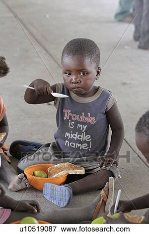 feeding, people, namibia, children, person, food View Large Photo Image Stock Photo - feeding, people, namibia, children, person, food. Fotosearch