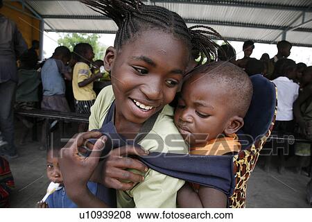 feeding, people, namibia, children, person, food View Large Photo Image Stock Photo - feeding, people, namibia, children, person, food. Fotosearch