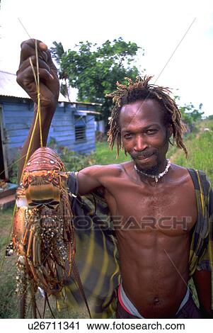 Stock Image - fish, male, jamaican, hand. Fotosearch