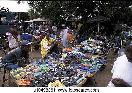 Stock Image - flipflops, person, market, birkama, gambia, people. Fotosearch