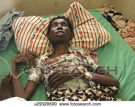 Stock Image - ghana, people, ill, 7819, person, woman. Fotosearch