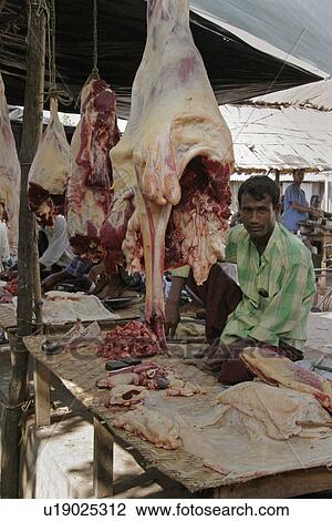 Stock Image - haluaghat, meat, market, outdoor, seller, bangladesh. Fotosearch