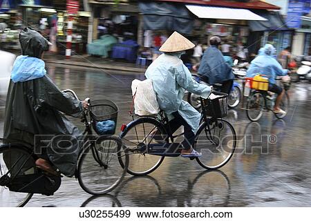 Stock Photo - hanoi, person, scene, street, vietnam, people. Fotosearch