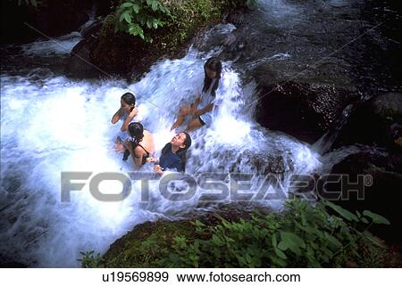 iligan, sport, waterfall, sitting, girls, water View Large Photo Image Stock Photo - iligan, sport, waterfall, sitting, girls, water. Fotosearch