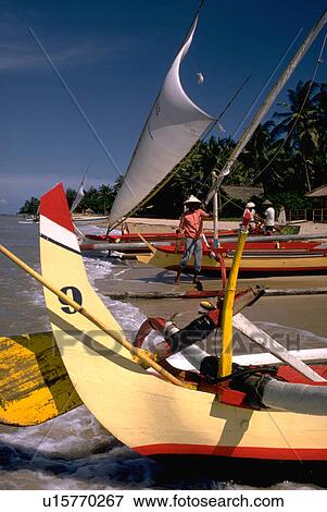 Stock Photo - indonesia, outrigger, bali, beach, boat, colorful. Fotosearch
