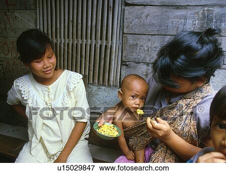 Stock Photo - indonesia, people, 4223, person, girl, baby. Fotosearch