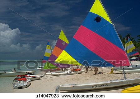Stock Image - island, scene, treasure, sails, colorful, beach. Fotosearch