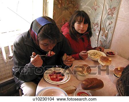 Picture - kitchen, hand, soup, russia, person, people. Fotosearch
