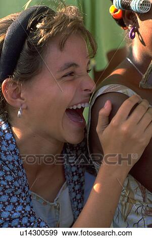 laughing, people, friends, home, girl, family View Large Photo Image Stock Photo - laughing, people, friends, home, girl, family. Fotosearch