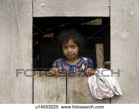 Stock Photography - looking, house, honduras, person, girl, people. Fotosearch