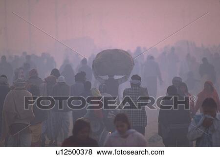 Stock Photo - male, bundle, large, carrying, hindu. Fotosearch