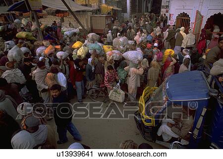 Stock Image - market, peasant, truck, street, crowd, hindu. Fotosearch
