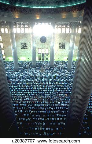 Stock Photo - mosque, thousands, indonesian, pray, worshipers, love. Fotosearch
