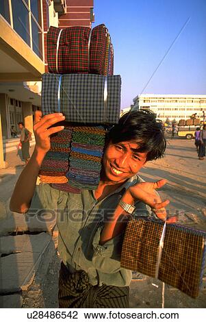 Stock Image - myanmar, people, burma, salesman, longyi, business. Fotosearch