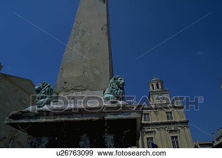 Stock Photo - outdoor, tower, lions, carved, base, stone. Fotosearch
