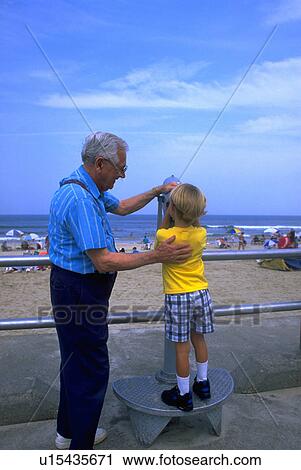 Stock Image - overlooking, grandson, family, generations, mixed, grandfather. Fotosearch