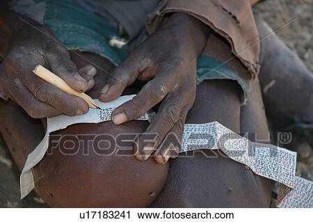 Stock Image - person, meregeta, ethiopia, book, people. Fotosearch