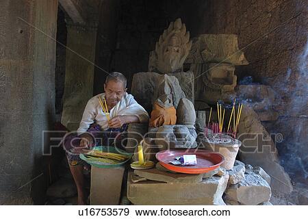 Stock Photo - person, prohm, shrine, cambodia, people. Fotosearch