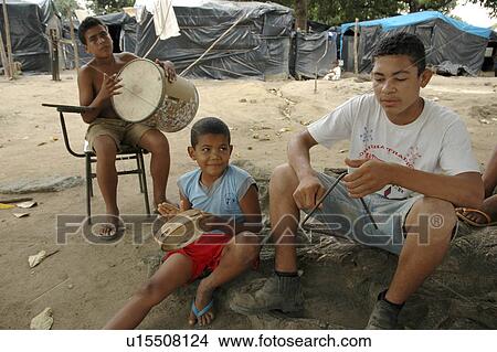Picture - playing, person, kids, boys, brazil, people. Fotosearch