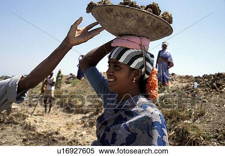 pond, person, dirt, carrying, india, people View Large Photo Image Stock Photography - pond, person, dirt, carrying, india, people. Fotosearch