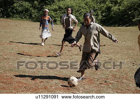 school, child, person, sport, football, people View Large Photo Image Stock Image - school, child, person, sport, football, people. Fotosearch