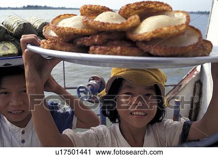 Stock Image - selling, people, girls, cambodia, person, car. Fotosearch