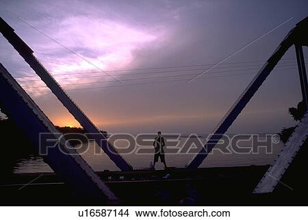 silhouette, silhouetted, standing, male, water View Large Photo Image Picture - silhouette, silhouetted, standing, male, water. Fotosearch