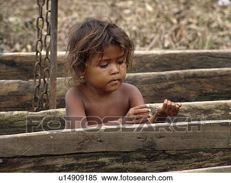 Stock Photography - sitting, child, colombia, kid, person, people. Fotosearch