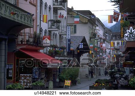 Stock Image - streets, bright, narrow, fly, flags, many. Fotosearch
