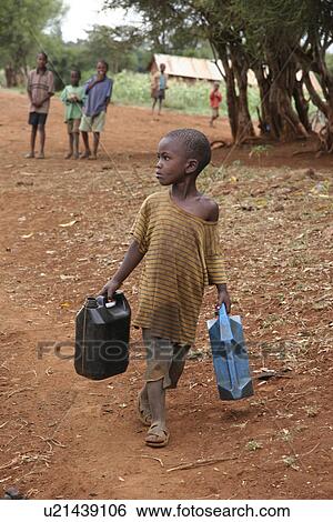tanzania, people, kid, person, child, water View Large Photo Image Stock Photograph - tanzania, people, kid, person, child, water. Fotosearch