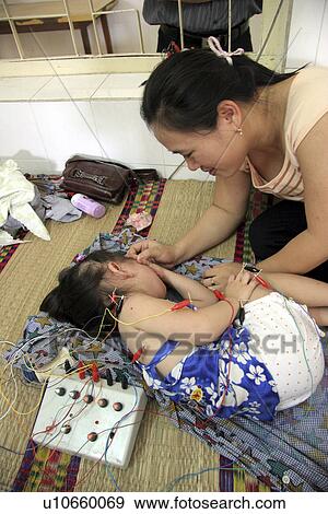 Stock Photo - vietnam, hand, kid, person, child, people. Fotosearch